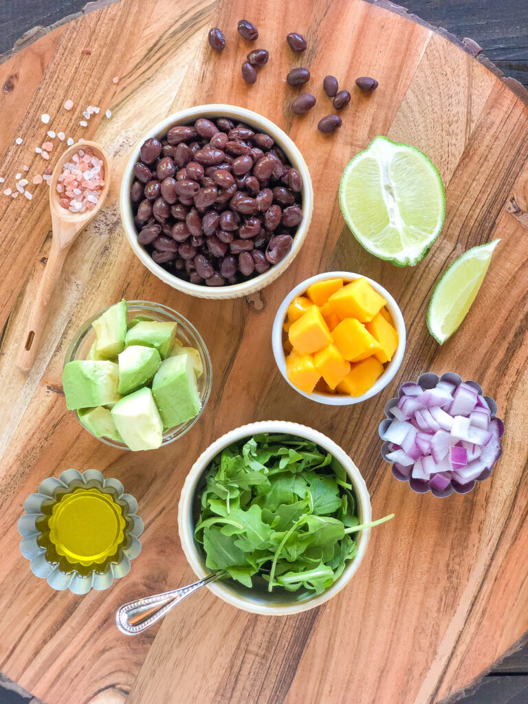 Mango black bean arugula salad