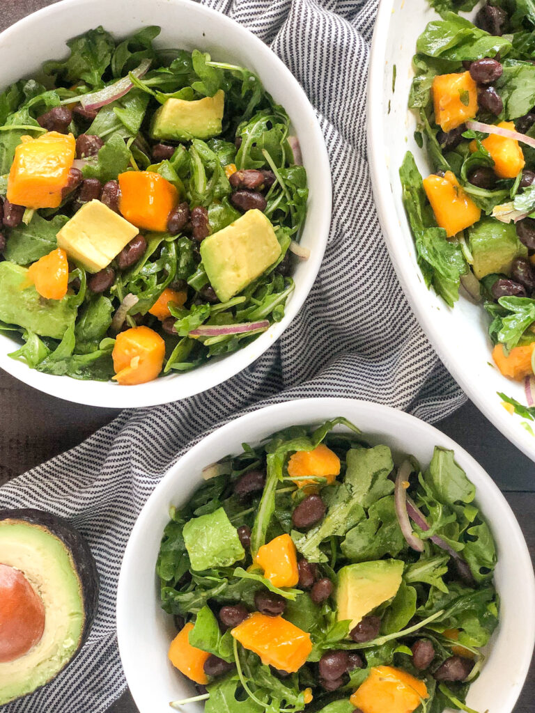 Mango black bean arugula salad